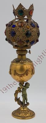 Miniature Cherub Banquet Lamp With Incredible Jeweled Shade.